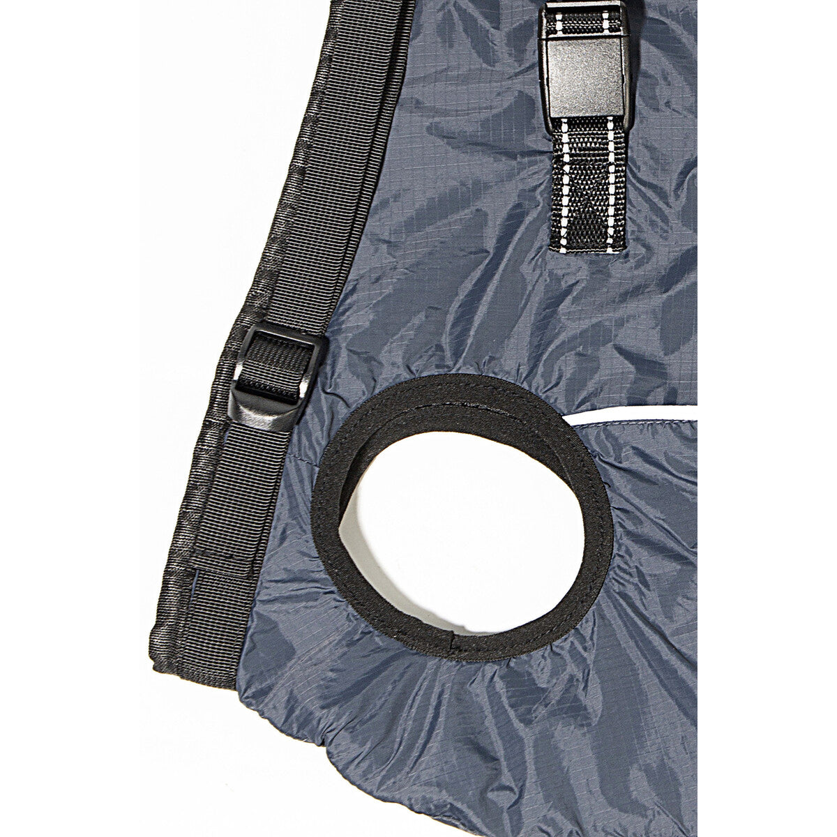 Close-up of adjustable buckle, strap and padded leg opening