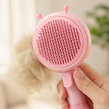 Close-up of the rounded grooming pins and handle on the ShedLess Duo brush